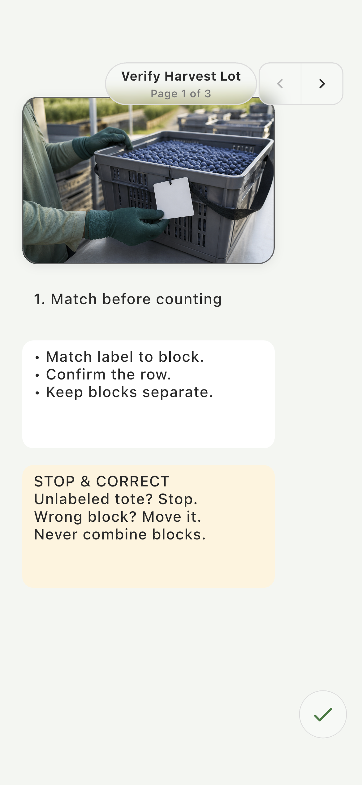Employee reviewing the visual tote-verification SOP for Harvest Quality Count